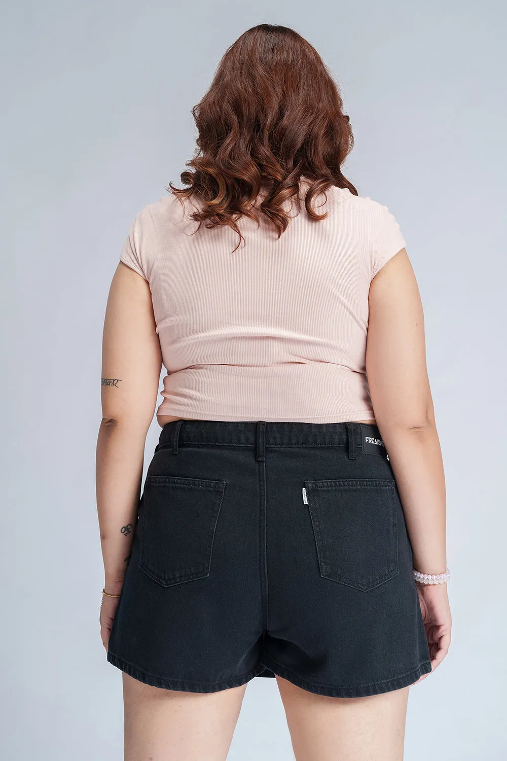 Dark Onyx Curve Asymmetric Waist Denim Skorts